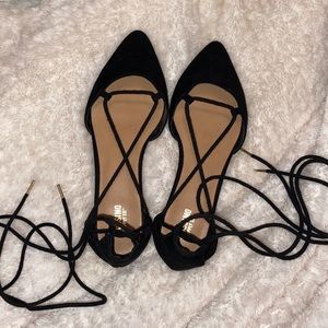 Black strappy flats